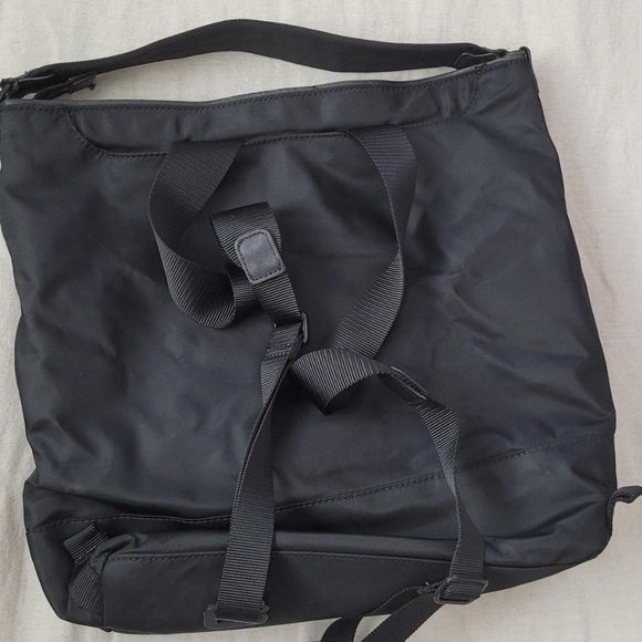 lululemon messenger bag Everywhere Wordmark Crossbody Belt 1L repellent finish keeps your bag and your belongings dry Compact Messenger Bags | lululemon